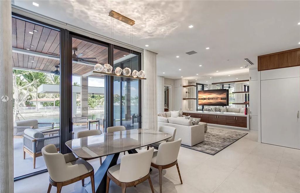 The Waterfront Home is a fully furnished smart residence with nice water views now available for sale. This home located at 2213 Keystone Blvd, North Miami, Florida; offering 5 bedrooms and 6 bathrooms with over 6,200 square feet of living spaces.
