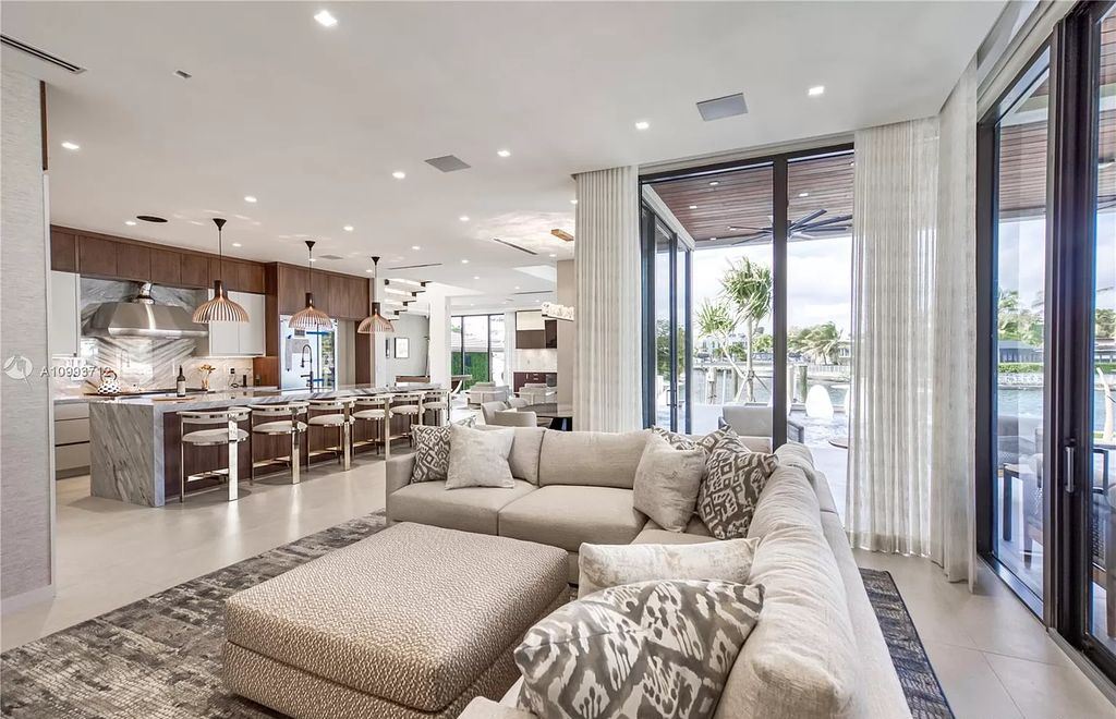 The Waterfront Home is a fully furnished smart residence with nice water views now available for sale. This home located at 2213 Keystone Blvd, North Miami, Florida; offering 5 bedrooms and 6 bathrooms with over 6,200 square feet of living spaces.
