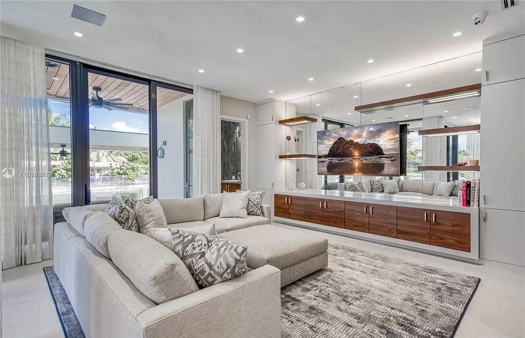 The Waterfront Home is a fully furnished smart residence with nice water views now available for sale. This home located at 2213 Keystone Blvd, North Miami, Florida; offering 5 bedrooms and 6 bathrooms with over 6,200 square feet of living spaces.