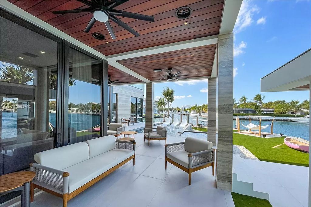 The Waterfront Home is a fully furnished smart residence with nice water views now available for sale. This home located at 2213 Keystone Blvd, North Miami, Florida; offering 5 bedrooms and 6 bathrooms with over 6,200 square feet of living spaces.