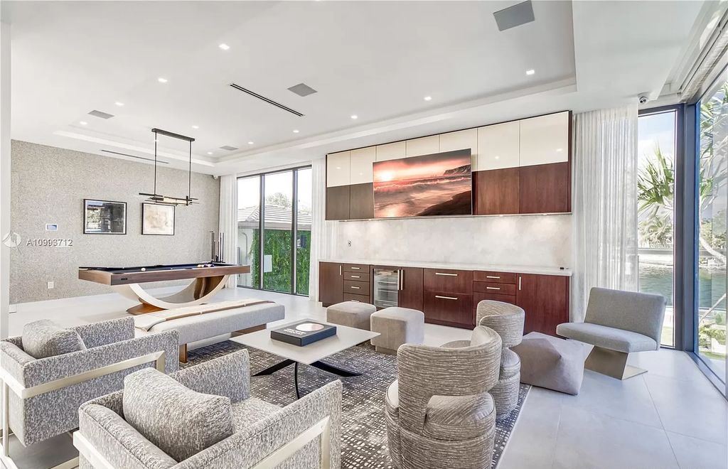The Waterfront Home is a fully furnished smart residence with nice water views now available for sale. This home located at 2213 Keystone Blvd, North Miami, Florida; offering 5 bedrooms and 6 bathrooms with over 6,200 square feet of living spaces.