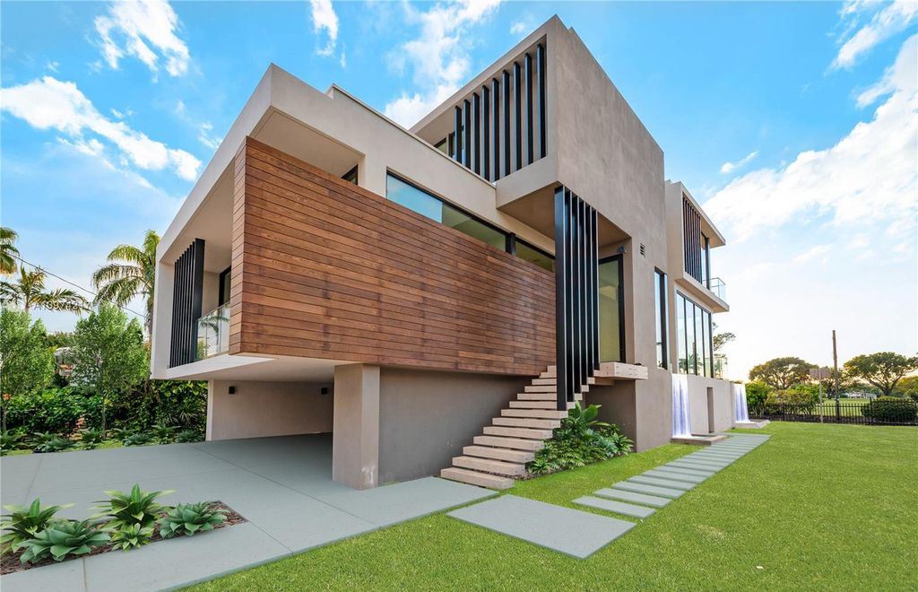 The Modern House in Miami Beach is a newly built tropical residence offering expansive western views of the La Gorce Country Club Golf Course now available for sale. This home located at 5470 La Gorce Dr, Miami Beach, Florida; offering 4 bedrooms and 4 bathrooms with over 3,600 square feet of living spaces.