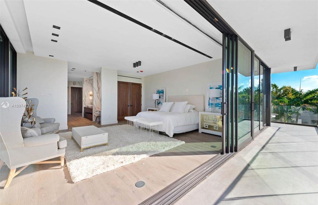 The Modern House in Miami Beach is a newly built tropical residence offering expansive western views of the La Gorce Country Club Golf Course now available for sale. This home located at 5470 La Gorce Dr, Miami Beach, Florida; offering 4 bedrooms and 4 bathrooms with over 3,600 square feet of living spaces.