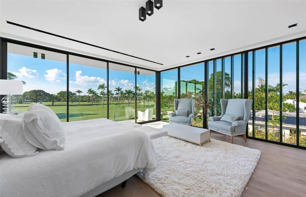 The Modern House in Miami Beach is a newly built tropical residence offering expansive western views of the La Gorce Country Club Golf Course now available for sale. This home located at 5470 La Gorce Dr, Miami Beach, Florida; offering 4 bedrooms and 4 bathrooms with over 3,600 square feet of living spaces.