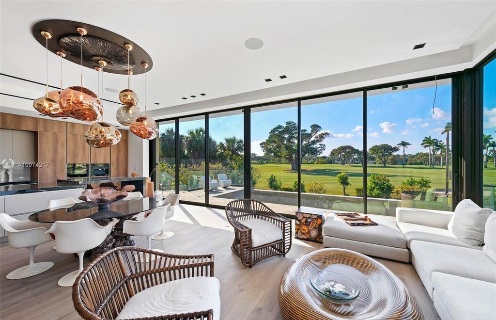 The Modern House in Miami Beach is a newly built tropical residence offering expansive western views of the La Gorce Country Club Golf Course now available for sale. This home located at 5470 La Gorce Dr, Miami Beach, Florida; offering 4 bedrooms and 4 bathrooms with over 3,600 square feet of living spaces.