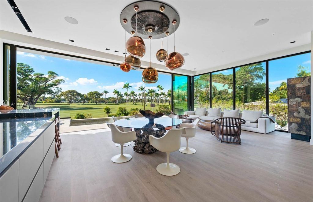The Modern House in Miami Beach is a newly built tropical residence offering expansive western views of the La Gorce Country Club Golf Course now available for sale. This home located at 5470 La Gorce Dr, Miami Beach, Florida; offering 4 bedrooms and 4 bathrooms with over 3,600 square feet of living spaces.