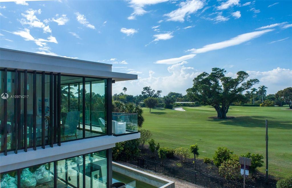 The Modern House in Miami Beach is a newly built tropical residence offering expansive western views of the La Gorce Country Club Golf Course now available for sale. This home located at 5470 La Gorce Dr, Miami Beach, Florida; offering 4 bedrooms and 4 bathrooms with over 3,600 square feet of living spaces.