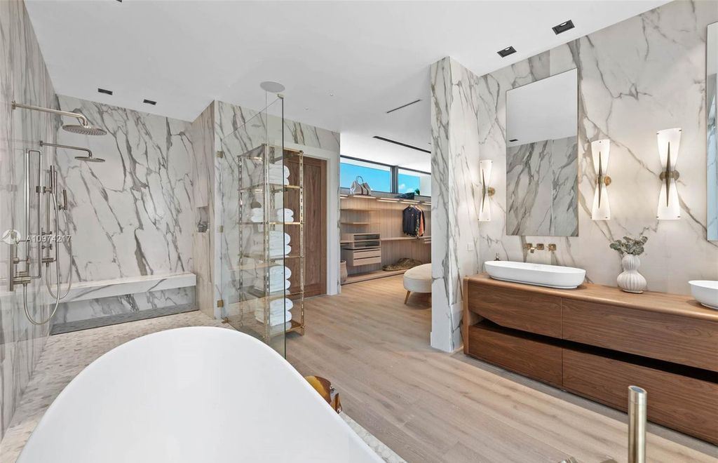 The Modern House in Miami Beach is a newly built tropical residence offering expansive western views of the La Gorce Country Club Golf Course now available for sale. This home located at 5470 La Gorce Dr, Miami Beach, Florida; offering 4 bedrooms and 4 bathrooms with over 3,600 square feet of living spaces.