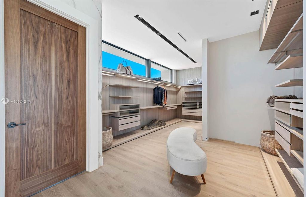 The Modern House in Miami Beach is a newly built tropical residence offering expansive western views of the La Gorce Country Club Golf Course now available for sale. This home located at 5470 La Gorce Dr, Miami Beach, Florida; offering 4 bedrooms and 4 bathrooms with over 3,600 square feet of living spaces.