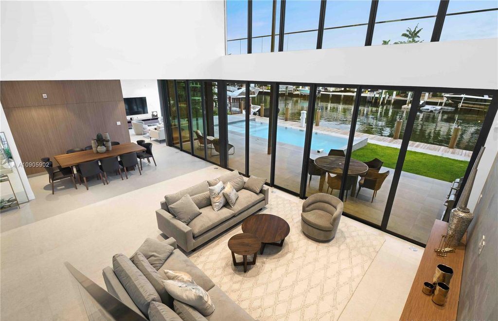 The Home in Fort Lauderdale is a sophisticated luxurious 2 story modern design on 70 foot of deep water now available for sale. This home located at 1537 SE 13th St, Fort Lauderdale, Florida; offering 6 bedrooms and 7 bathrooms with over 4,700 square feet of living spaces.