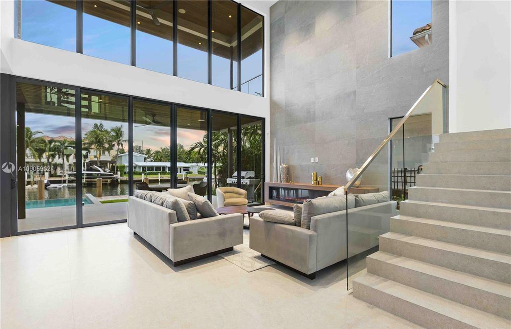 The Home in Fort Lauderdale is a sophisticated luxurious 2 story modern design on 70 foot of deep water now available for sale. This home located at 1537 SE 13th St, Fort Lauderdale, Florida; offering 6 bedrooms and 7 bathrooms with over 4,700 square feet of living spaces.