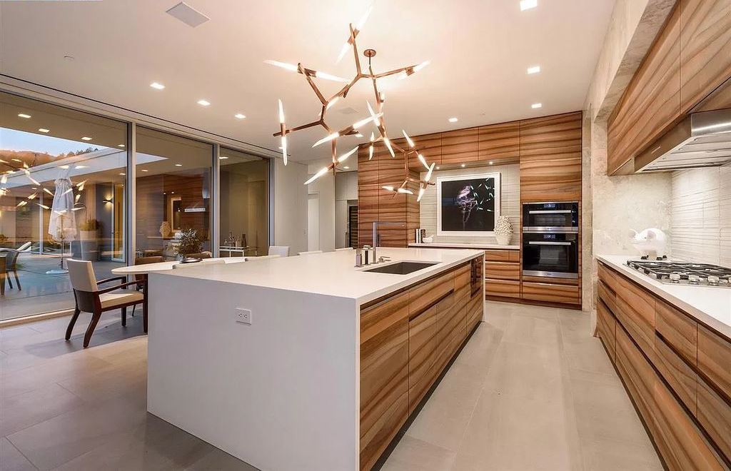 The Estate in California is an extraordinary Napa Valley property features wellness pavilion, sport court, infinity pool now available for sale. This home located at 1561 S Whitehall Ln, Saint Helena, California; offering 7 bedrooms and 11 bathrooms with over 14,000 square feet of living spaces.