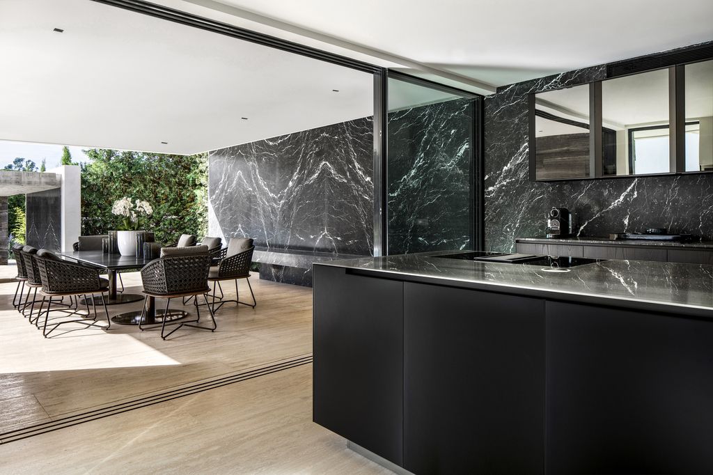 Le Pine House in Saint Tropez, France was designed by SAOTA in Modern style is a contemporary interpretation of traditional Mediterranean Riviera architecture. This house offers luxurious living with high end finishes and smart amenities.