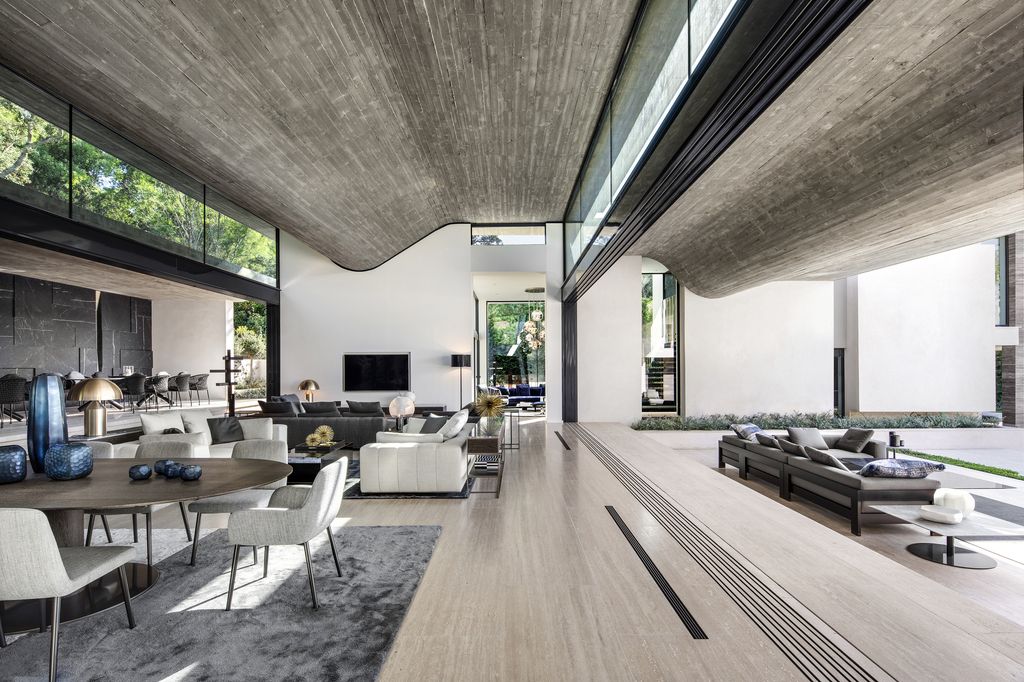 Le Pine House in Saint Tropez, France was designed by SAOTA in Modern style is a contemporary interpretation of traditional Mediterranean Riviera architecture. This house offers luxurious living with high end finishes and smart amenities.