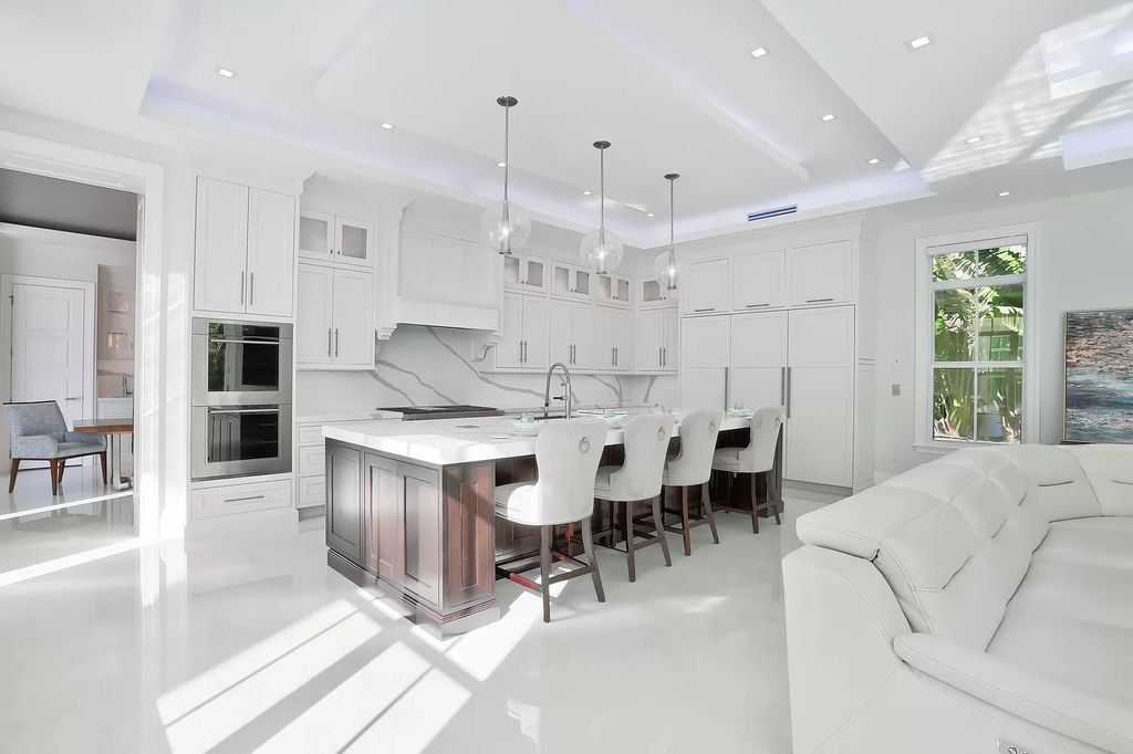 The West Palm Beach House is a luxurious dream home to experience true luxury lifestyle with impressive finishes now available for sale. This home located at 14100 N Miller Dr, West Palm Beach, Florida; offering 5 bedrooms and 8 bathrooms with over 5,100 square feet of living spaces.