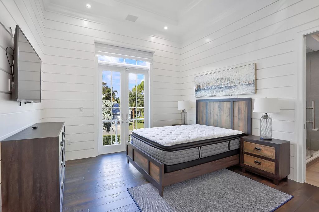 The West Palm Beach House is a luxurious dream home to experience true luxury lifestyle with impressive finishes now available for sale. This home located at 14100 N Miller Dr, West Palm Beach, Florida; offering 5 bedrooms and 8 bathrooms with over 5,100 square feet of living spaces.