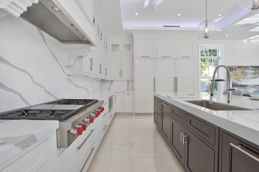 The West Palm Beach House is a luxurious dream home to experience true luxury lifestyle with impressive finishes now available for sale. This home located at 14100 N Miller Dr, West Palm Beach, Florida; offering 5 bedrooms and 8 bathrooms with over 5,100 square feet of living spaces.