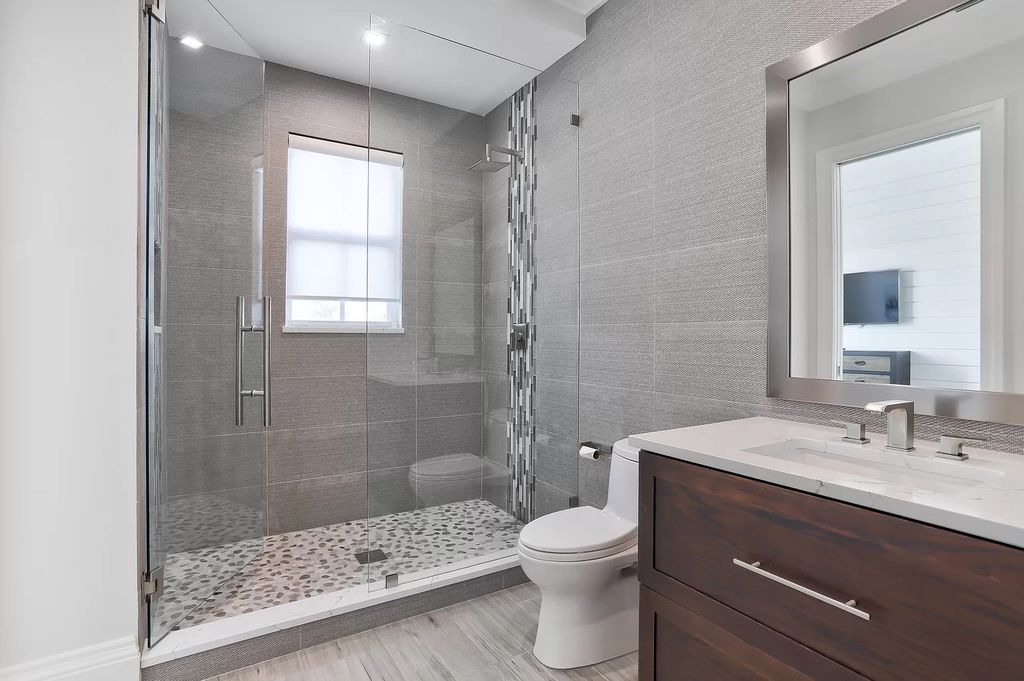 The West Palm Beach House is a luxurious dream home to experience true luxury lifestyle with impressive finishes now available for sale. This home located at 14100 N Miller Dr, West Palm Beach, Florida; offering 5 bedrooms and 8 bathrooms with over 5,100 square feet of living spaces.
