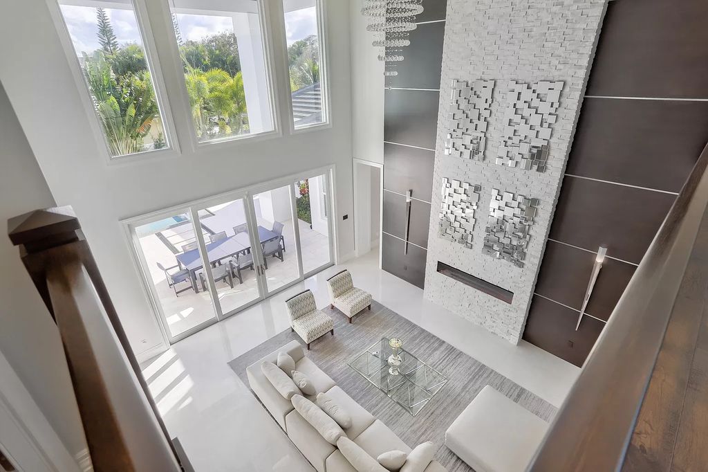 The West Palm Beach House is a luxurious dream home to experience true luxury lifestyle with impressive finishes now available for sale. This home located at 14100 N Miller Dr, West Palm Beach, Florida; offering 5 bedrooms and 8 bathrooms with over 5,100 square feet of living spaces.