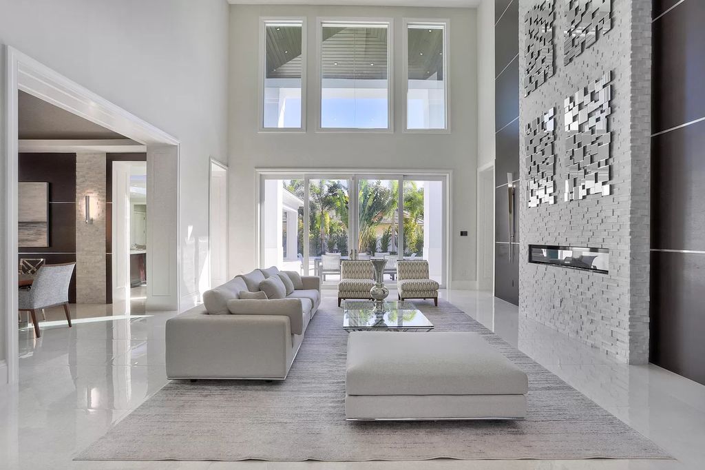 The West Palm Beach House is a luxurious dream home to experience true luxury lifestyle with impressive finishes now available for sale. This home located at 14100 N Miller Dr, West Palm Beach, Florida; offering 5 bedrooms and 8 bathrooms with over 5,100 square feet of living spaces.