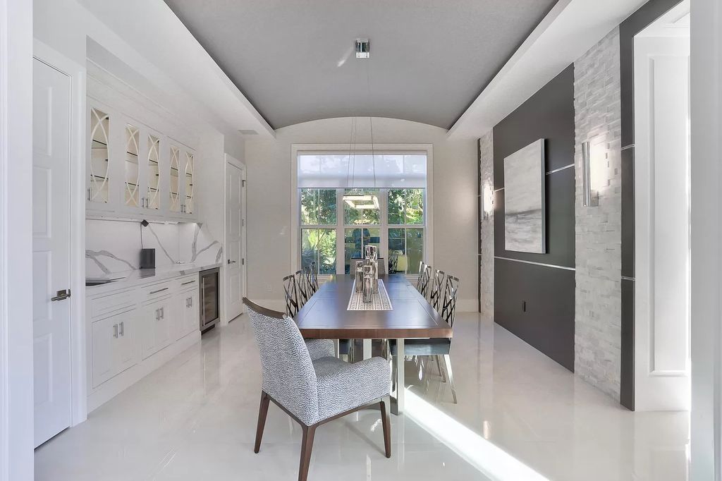 The West Palm Beach House is a luxurious dream home to experience true luxury lifestyle with impressive finishes now available for sale. This home located at 14100 N Miller Dr, West Palm Beach, Florida; offering 5 bedrooms and 8 bathrooms with over 5,100 square feet of living spaces.