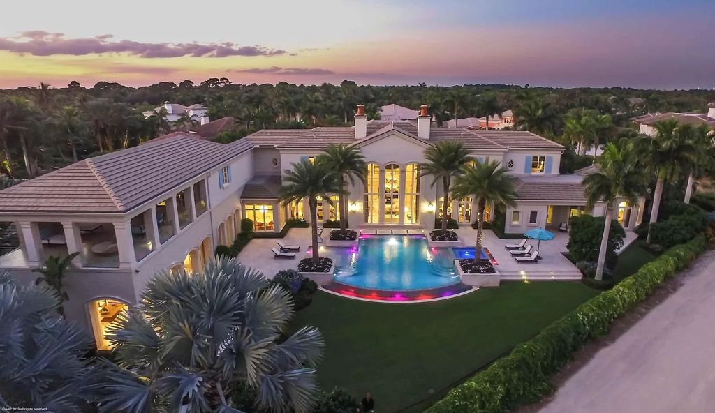The Custom Home in Florida is a luxurious estate situated on the finest lot in prestigious Old Palm now available for sale. This home located at 11748 Bella Donna Ct, Palm Beach Gardens, Florida; offering 6 bedrooms and 9 bathrooms with over 10,000 square feet of living spaces.