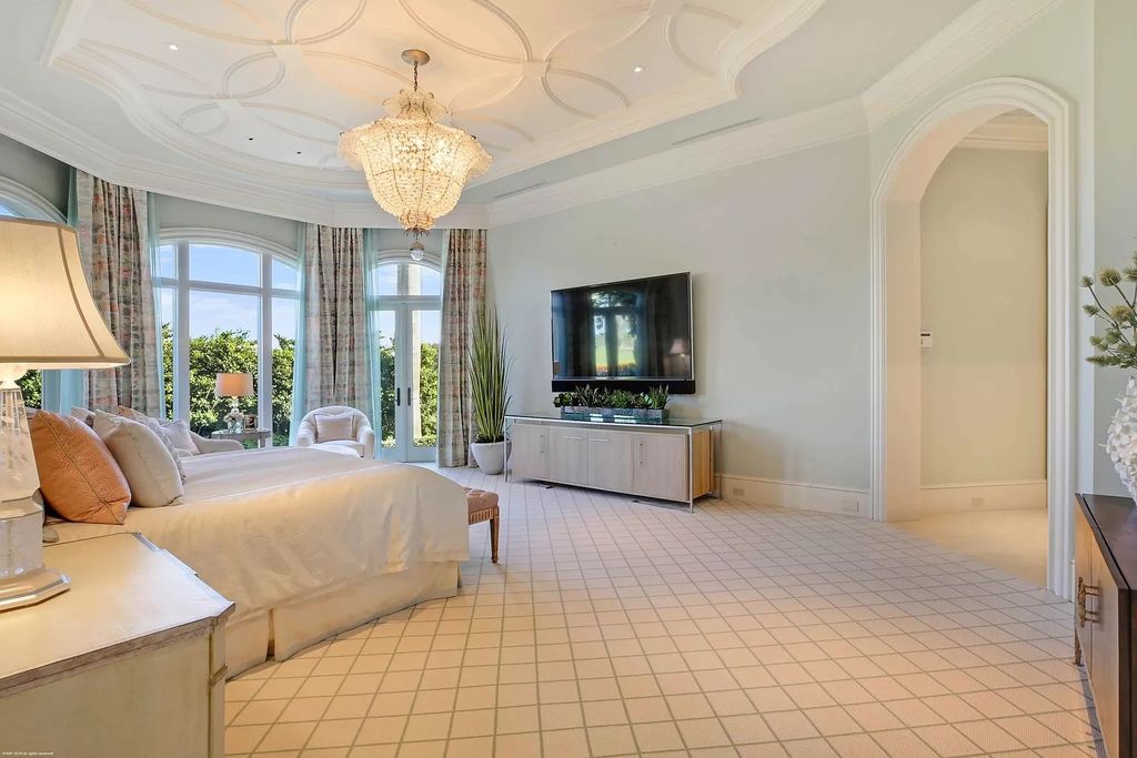 The Custom Home in Florida is a luxurious estate situated on the finest lot in prestigious Old Palm now available for sale. This home located at 11748 Bella Donna Ct, Palm Beach Gardens, Florida; offering 6 bedrooms and 9 bathrooms with over 10,000 square feet of living spaces.