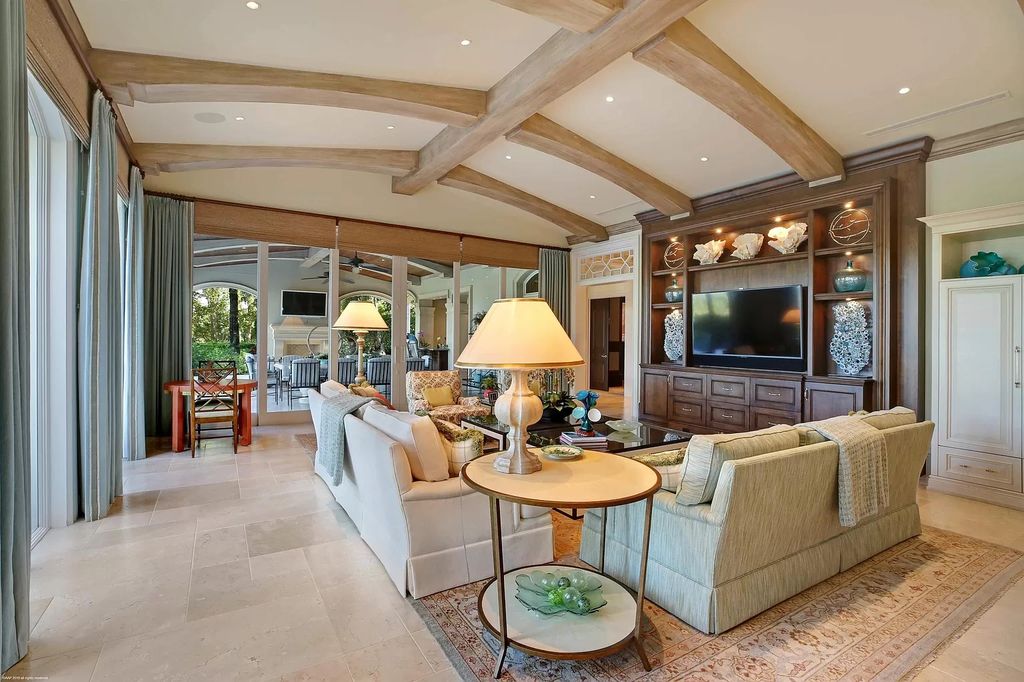 The Custom Home in Florida is a luxurious estate situated on the finest lot in prestigious Old Palm now available for sale. This home located at 11748 Bella Donna Ct, Palm Beach Gardens, Florida; offering 6 bedrooms and 9 bathrooms with over 10,000 square feet of living spaces.