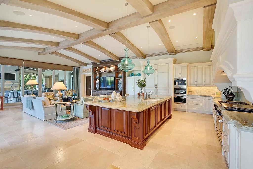 The Custom Home in Florida is a luxurious estate situated on the finest lot in prestigious Old Palm now available for sale. This home located at 11748 Bella Donna Ct, Palm Beach Gardens, Florida; offering 6 bedrooms and 9 bathrooms with over 10,000 square feet of living spaces.