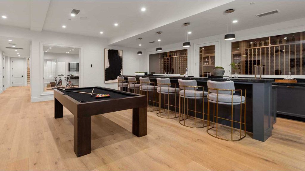 The New Construction Home in prestigious Brentwood Park features the highest caliber of finishes and spacious grounds now available for sale. This home located at 12730 Hanover St, Los Angeles, California; offering 8 bedrooms and 10 bathrooms with over 13,000 square feet of living spaces.