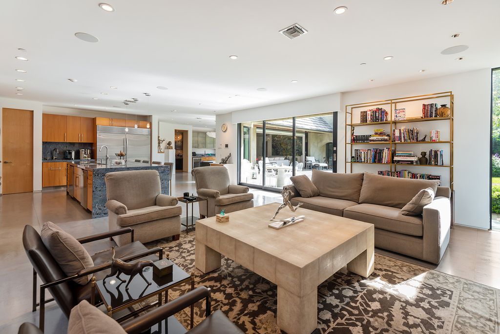 The Home in Los Angeles is an absolutely breathtaking property perfects for outdoor entertaining with the cozy loggia & fireplace now available for sale. This home located at 383 S Beverly Glen Blvd, Los Angeles, California; offering 6 bedrooms and 8 bathrooms with over 7,000 square feet of living spaces.