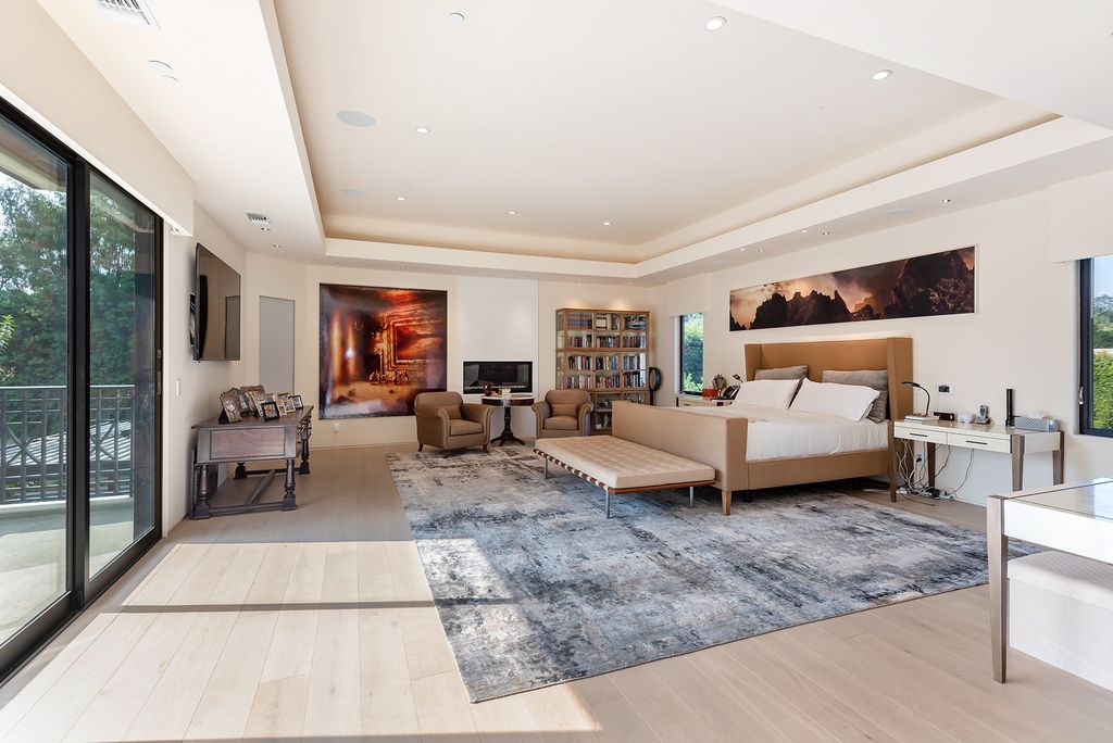 The Home in Los Angeles is an absolutely breathtaking property perfects for outdoor entertaining with the cozy loggia & fireplace now available for sale. This home located at 383 S Beverly Glen Blvd, Los Angeles, California; offering 6 bedrooms and 8 bathrooms with over 7,000 square feet of living spaces.