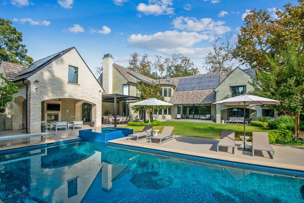 The Home in Los Angeles is an absolutely breathtaking property perfects for outdoor entertaining with the cozy loggia & fireplace now available for sale. This home located at 383 S Beverly Glen Blvd, Los Angeles, California; offering 6 bedrooms and 8 bathrooms with over 7,000 square feet of living spaces.