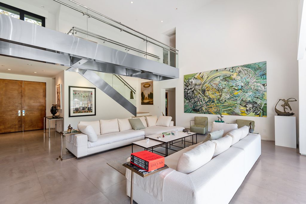 The Home in Los Angeles is an absolutely breathtaking property perfects for outdoor entertaining with the cozy loggia & fireplace now available for sale. This home located at 383 S Beverly Glen Blvd, Los Angeles, California; offering 6 bedrooms and 8 bathrooms with over 7,000 square feet of living spaces.