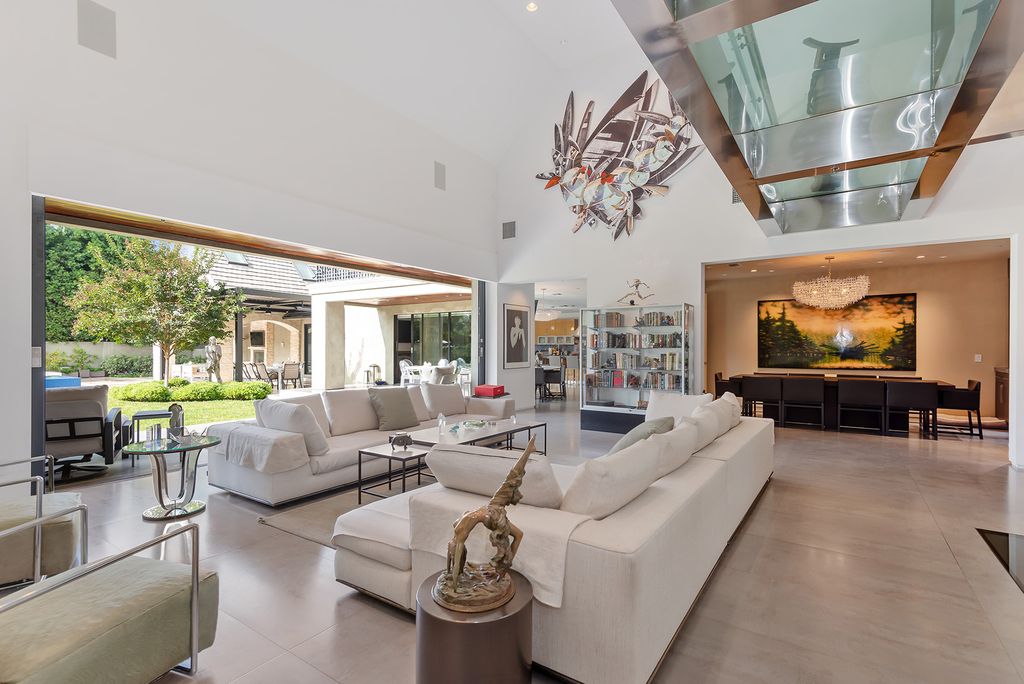 The Home in Los Angeles is an absolutely breathtaking property perfects for outdoor entertaining with the cozy loggia & fireplace now available for sale. This home located at 383 S Beverly Glen Blvd, Los Angeles, California; offering 6 bedrooms and 8 bathrooms with over 7,000 square feet of living spaces.