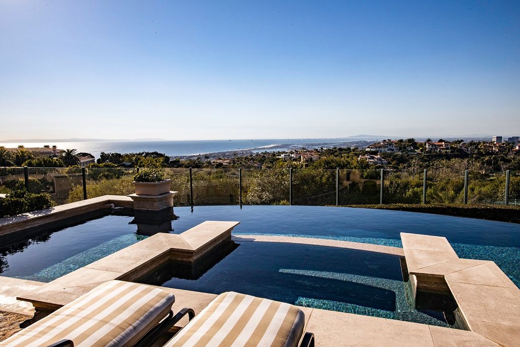 The Newport Coast Home boasts coastal southern California grandeur throughout on a front row unobstructed hilltop now available for sale. This home located at 7 Sailcrest, Newport Coast, California; offering 7 bedrooms and 8 bathrooms with over 9,800 square feet of living spaces.
