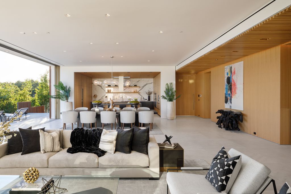 The Hollywood Hills Mansion is an amenity-rich entertainer’s paradise within walking distance to the iconic Sunset Strip now available for sale. This home located at 1422 Devlin Dr, Los Angeles, California; offering 6 bedrooms and 10 bathrooms with over 10,000 square feet of living spaces.