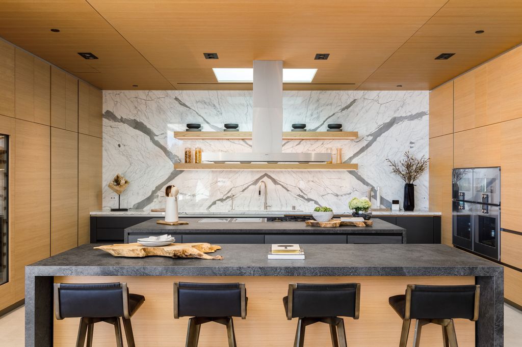 The Hollywood Hills Mansion is an amenity-rich entertainer’s paradise within walking distance to the iconic Sunset Strip now available for sale. This home located at 1422 Devlin Dr, Los Angeles, California; offering 6 bedrooms and 10 bathrooms with over 10,000 square feet of living spaces.