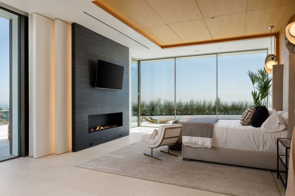 The Hollywood Hills Mansion is an amenity-rich entertainer’s paradise within walking distance to the iconic Sunset Strip now available for sale. This home located at 1422 Devlin Dr, Los Angeles, California; offering 6 bedrooms and 10 bathrooms with over 10,000 square feet of living spaces.