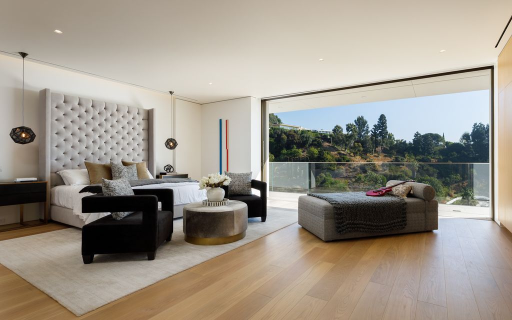 The Hollywood Hills Mansion is an amenity-rich entertainer’s paradise within walking distance to the iconic Sunset Strip now available for sale. This home located at 1422 Devlin Dr, Los Angeles, California; offering 6 bedrooms and 10 bathrooms with over 10,000 square feet of living spaces.
