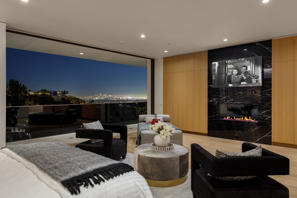 The Hollywood Hills Mansion is an amenity-rich entertainer’s paradise within walking distance to the iconic Sunset Strip now available for sale. This home located at 1422 Devlin Dr, Los Angeles, California; offering 6 bedrooms and 10 bathrooms with over 10,000 square feet of living spaces.