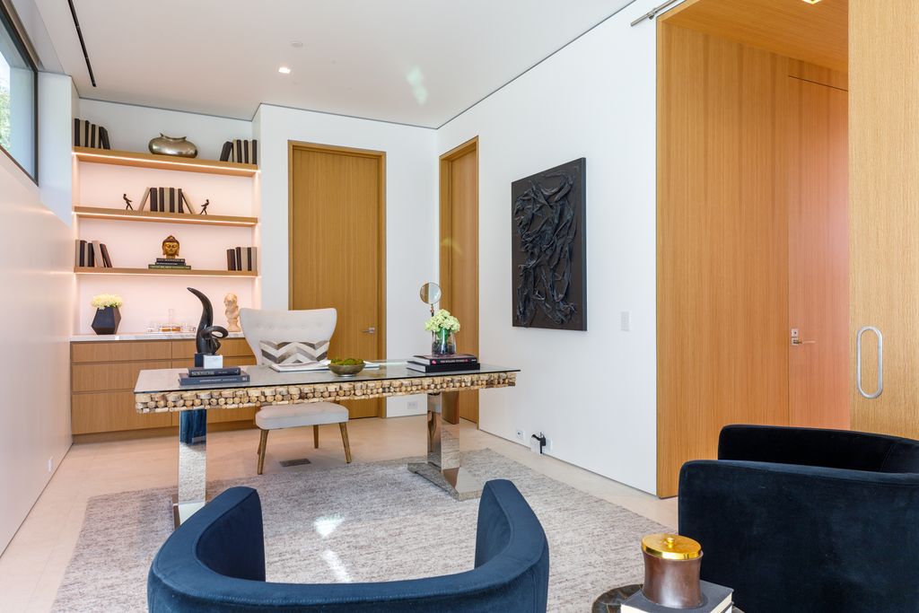 The Hollywood Hills Mansion is an amenity-rich entertainer’s paradise within walking distance to the iconic Sunset Strip now available for sale. This home located at 1422 Devlin Dr, Los Angeles, California; offering 6 bedrooms and 10 bathrooms with over 10,000 square feet of living spaces.