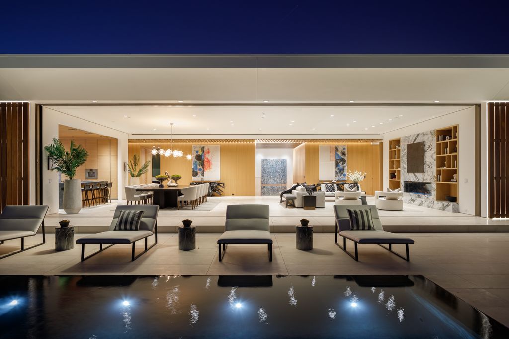 The Hollywood Hills Mansion is an amenity-rich entertainer’s paradise within walking distance to the iconic Sunset Strip now available for sale. This home located at 1422 Devlin Dr, Los Angeles, California; offering 6 bedrooms and 10 bathrooms with over 10,000 square feet of living spaces.