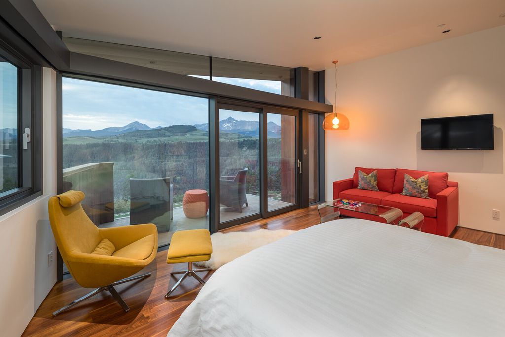 The Colorado Mansion is a modern architectural masterpiece is perched on a point featuring thrilling views of Telluride's most dramatic peaks now available for sale. This home located at 296 Gray Head Ln, Telluride, Colorado; offering 6 bedrooms and 10 bathrooms with over 11,800 square feet of living spaces.