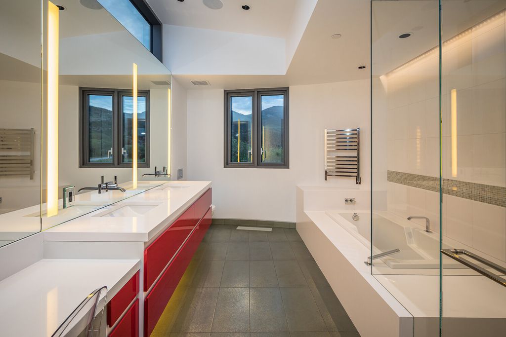 The Colorado Mansion is a modern architectural masterpiece is perched on a point featuring thrilling views of Telluride's most dramatic peaks now available for sale. This home located at 296 Gray Head Ln, Telluride, Colorado; offering 6 bedrooms and 10 bathrooms with over 11,800 square feet of living spaces.