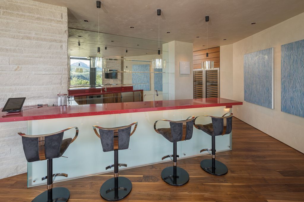 The Colorado Mansion is a modern architectural masterpiece is perched on a point featuring thrilling views of Telluride's most dramatic peaks now available for sale. This home located at 296 Gray Head Ln, Telluride, Colorado; offering 6 bedrooms and 10 bathrooms with over 11,800 square feet of living spaces.