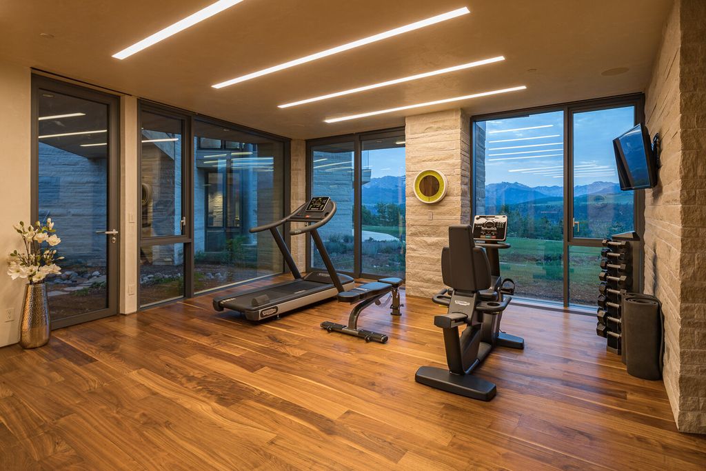 The Colorado Mansion is a modern architectural masterpiece is perched on a point featuring thrilling views of Telluride's most dramatic peaks now available for sale. This home located at 296 Gray Head Ln, Telluride, Colorado; offering 6 bedrooms and 10 bathrooms with over 11,800 square feet of living spaces.