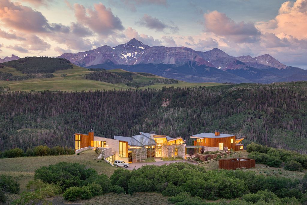 The Colorado Mansion is a modern architectural masterpiece is perched on a point featuring thrilling views of Telluride's most dramatic peaks now available for sale. This home located at 296 Gray Head Ln, Telluride, Colorado; offering 6 bedrooms and 10 bathrooms with over 11,800 square feet of living spaces.