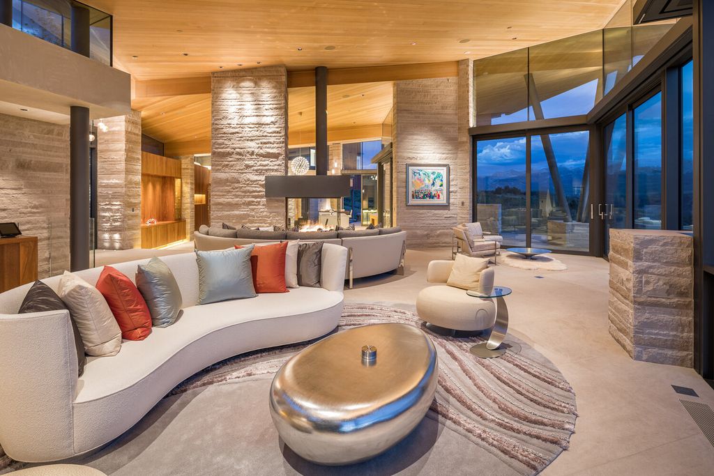 The Colorado Mansion is a modern architectural masterpiece is perched on a point featuring thrilling views of Telluride's most dramatic peaks now available for sale. This home located at 296 Gray Head Ln, Telluride, Colorado; offering 6 bedrooms and 10 bathrooms with over 11,800 square feet of living spaces.