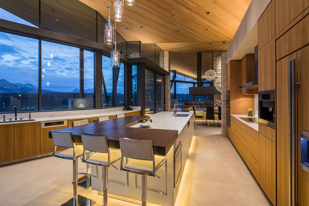 The Colorado Mansion is a modern architectural masterpiece is perched on a point featuring thrilling views of Telluride's most dramatic peaks now available for sale. This home located at 296 Gray Head Ln, Telluride, Colorado; offering 6 bedrooms and 10 bathrooms with over 11,800 square feet of living spaces.